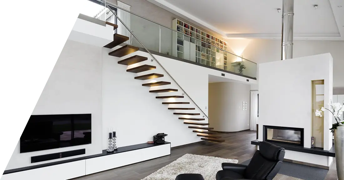 Moderne Wohnzimmereinrichtung mit schwebenden Kragarmtreppen, Kamin und minimalistischer Einrichtung.