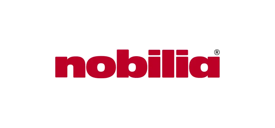 Das Bild zeigt das Wort „nobilia“ in roten Kleinbuchstaben auf weißem Hintergrund, mit dem Buchstaben „i“ gepunktet mit einem roten Kreis und einem eingetragenen Markensymbol (®) daneben